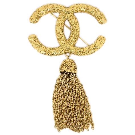 chanel fringe brooch